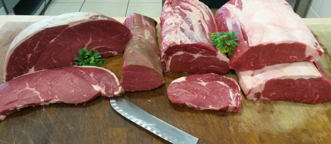 Beef cuts on chopping boardp